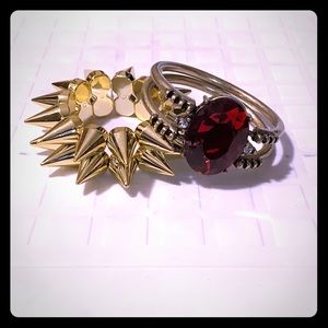 Gold reversible jewel and spike bracelets…